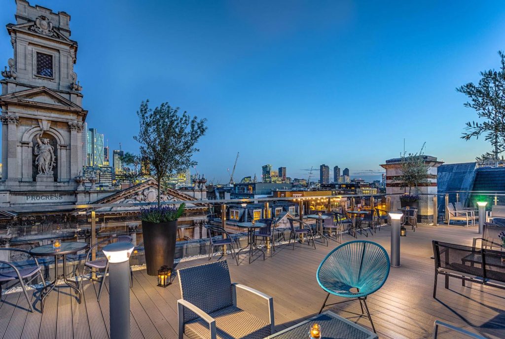 Rooftop bar in London with the city in the background